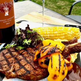 Steak dinner with corn & grilled peaches